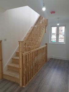 Oak staircase with contrasting spindles 