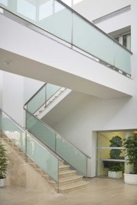 Modern staircase design with a walkway 