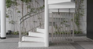 A spiral steel staircase in pristine white for outdoors 