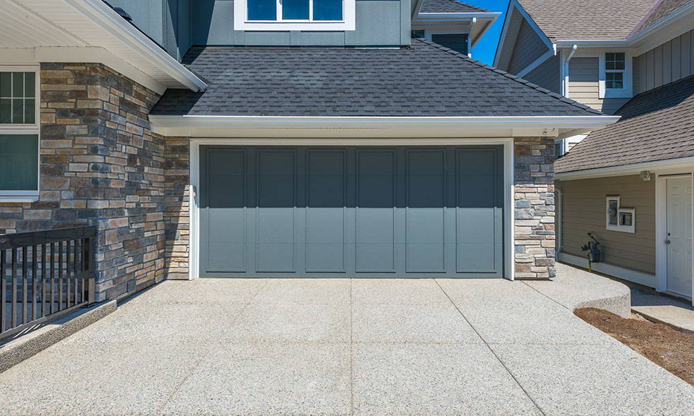 Well planned garage loft conversion with driveway